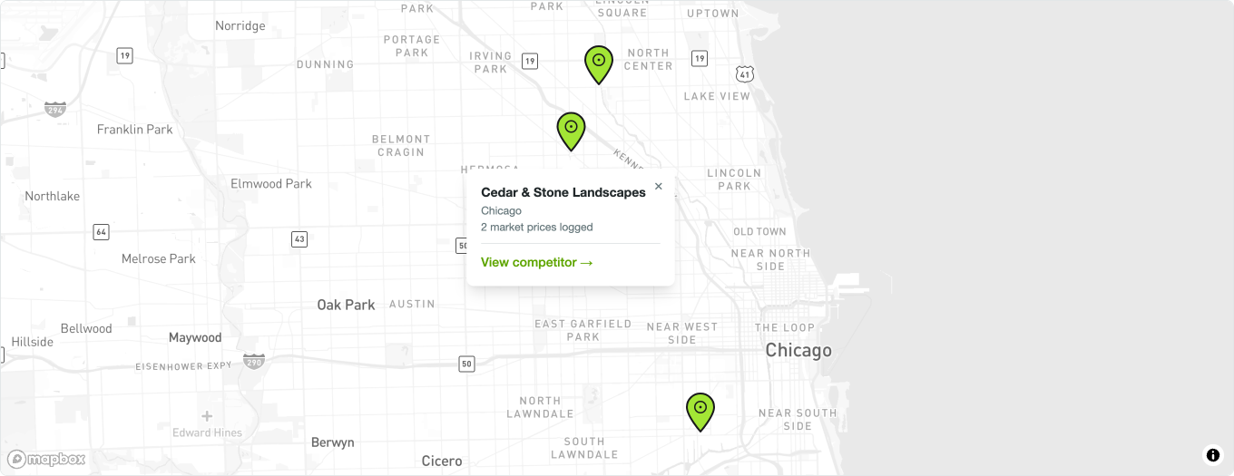 The competitors map with four pins across a city and one pin's panel open, showing the competitor's name, city, how many market prices are logged against it, and a View competitor link.